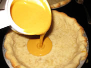 pour pumpkin in to pie shell